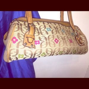 Fossil’s Jacquard Signature Logo Shoulder Bag